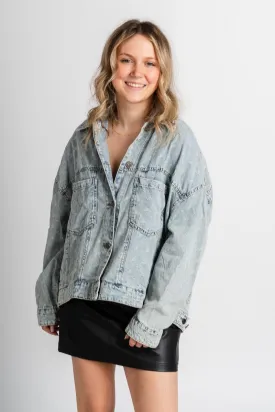 Distressed denim jacket light blue