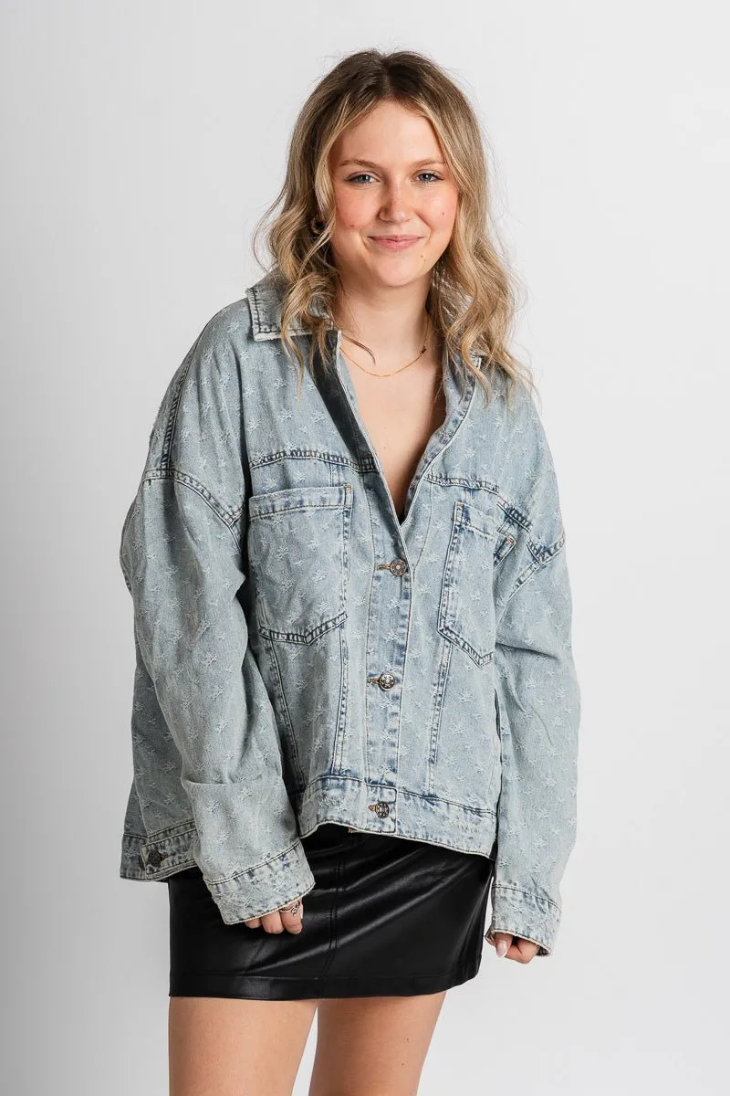 Distressed denim jacket light blue