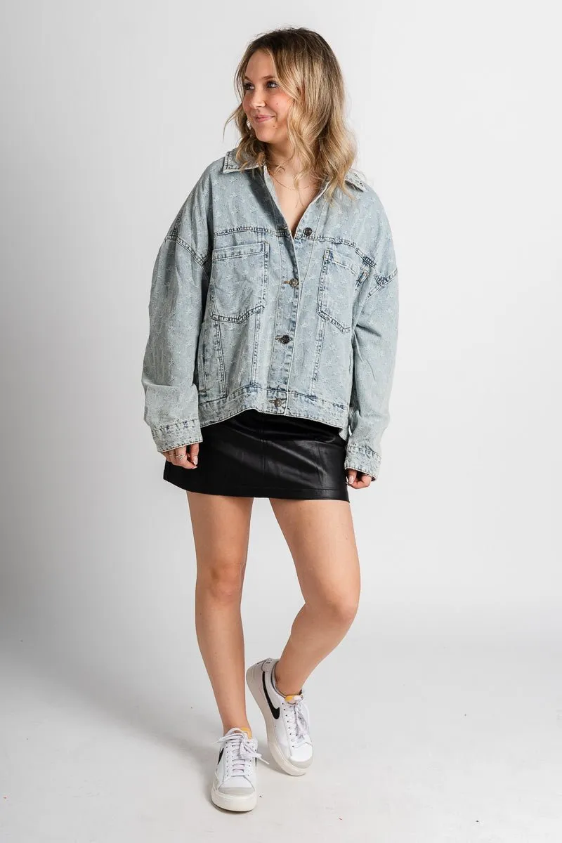 Distressed denim jacket light blue